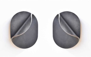 Slice Sconce Oval – blackened steel with polished edge