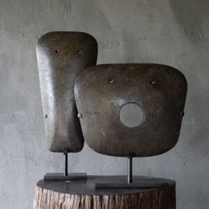 Stone Plow Head Sculpture on Iron Stand